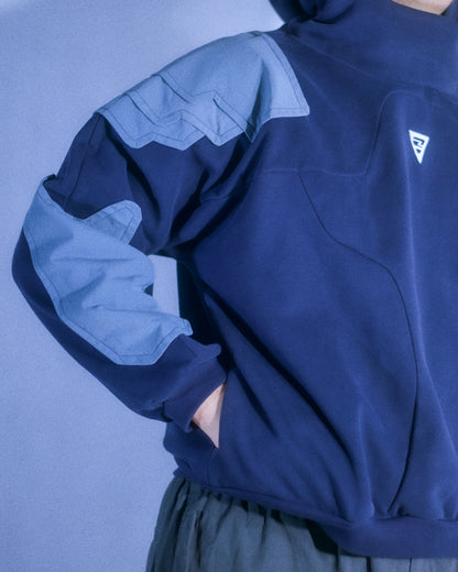 Navy hoodie with cyberpunk armor details, front model view