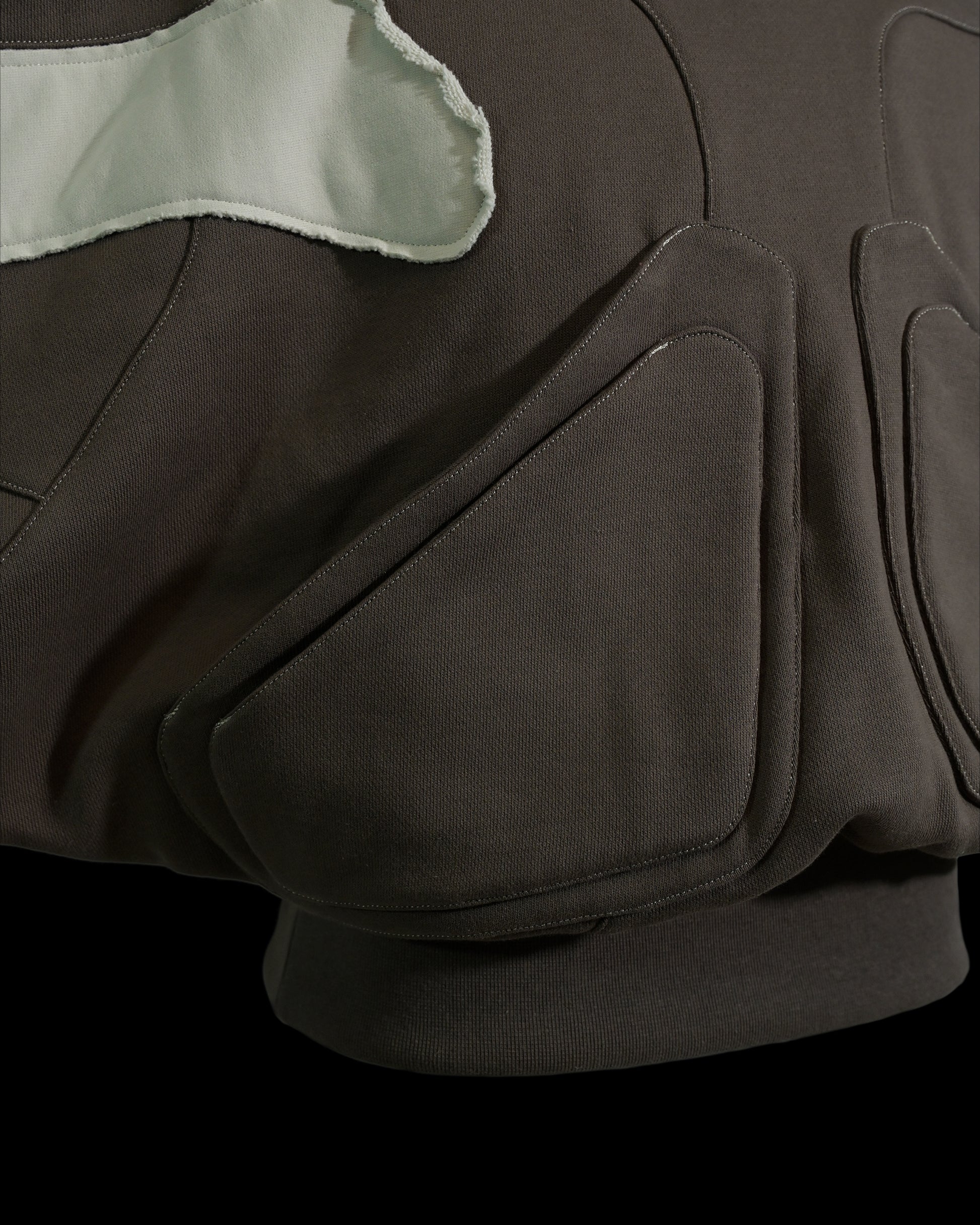 sci-fi women's mocha cropped sweater, front pockets view