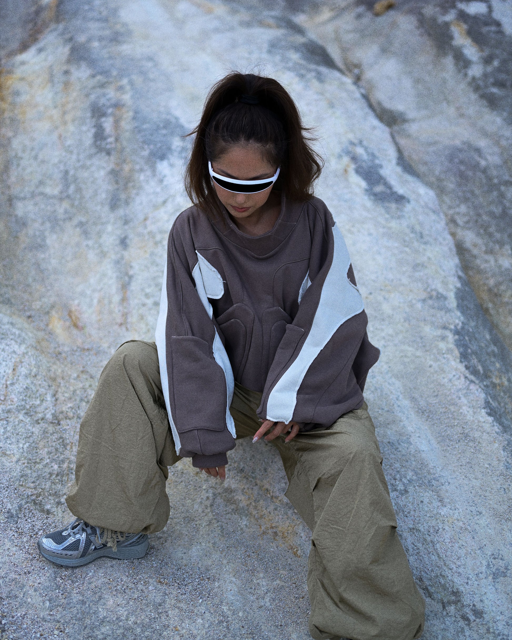 sci-fi women's mocha cropped sweater, front model sitting down view