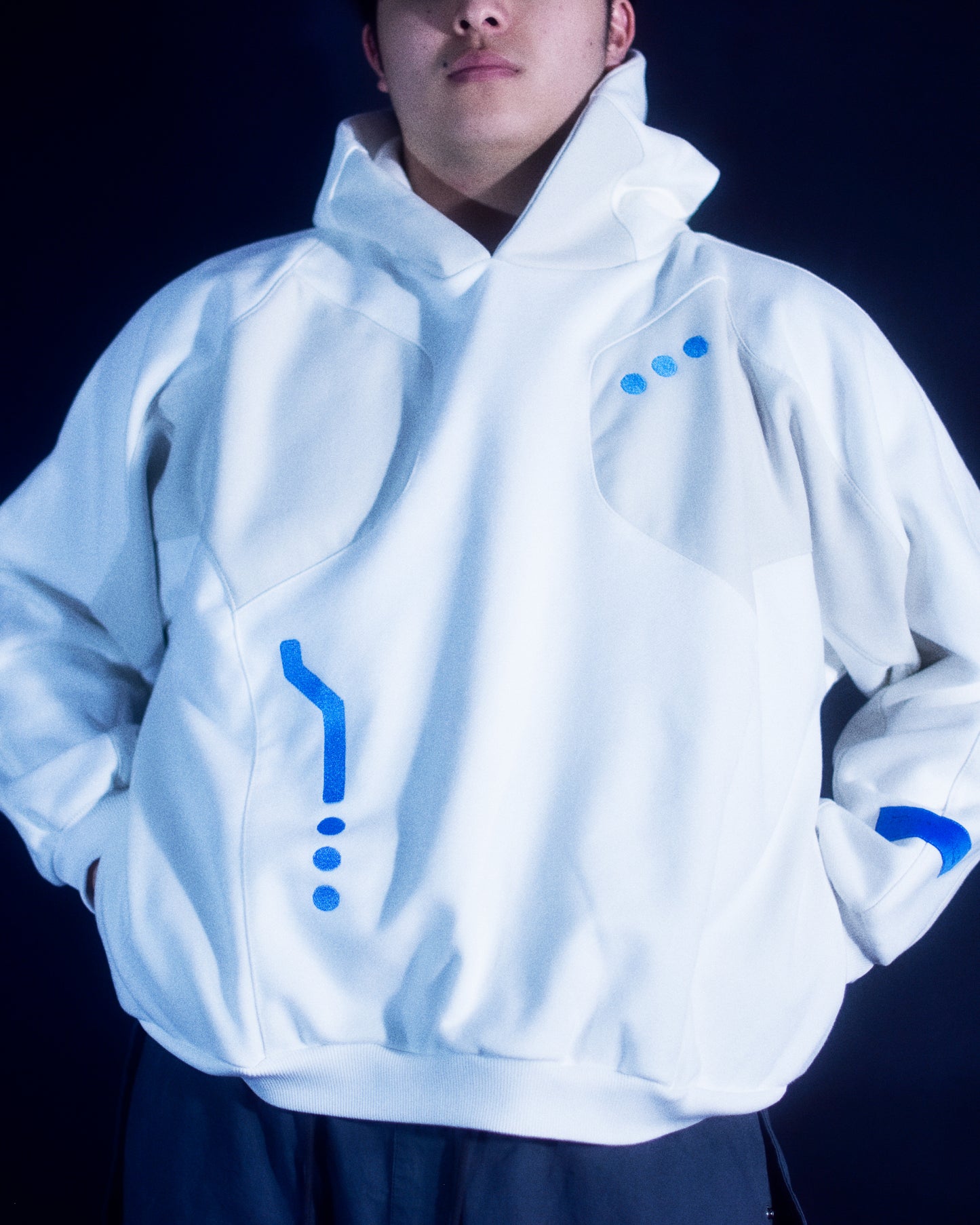 white atompunk interstellar archive fashion hoodie, front model view
