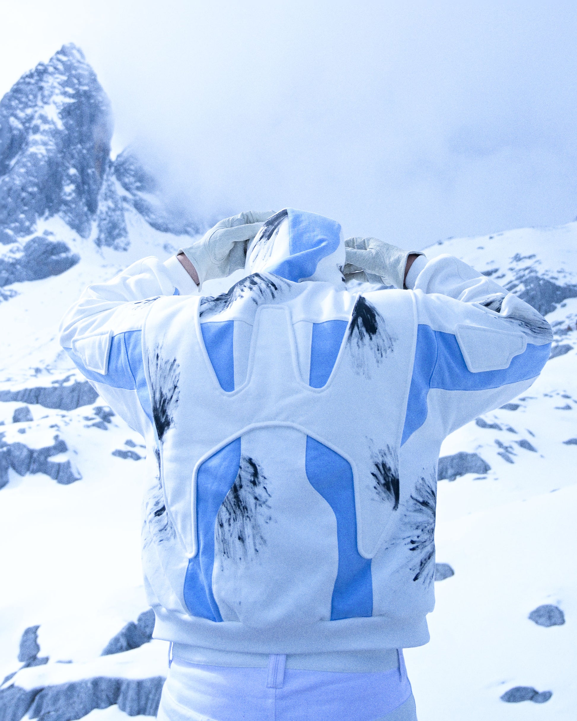 white futuristic cyber core ski jacket, back model view