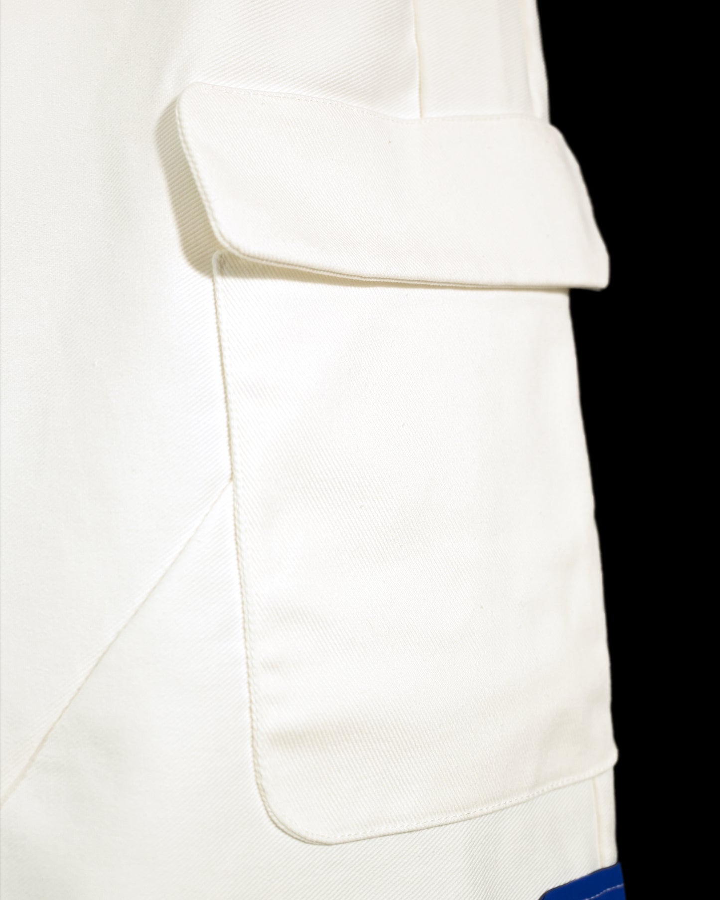 white lunar space streetwear ski pants, side pocket detail view