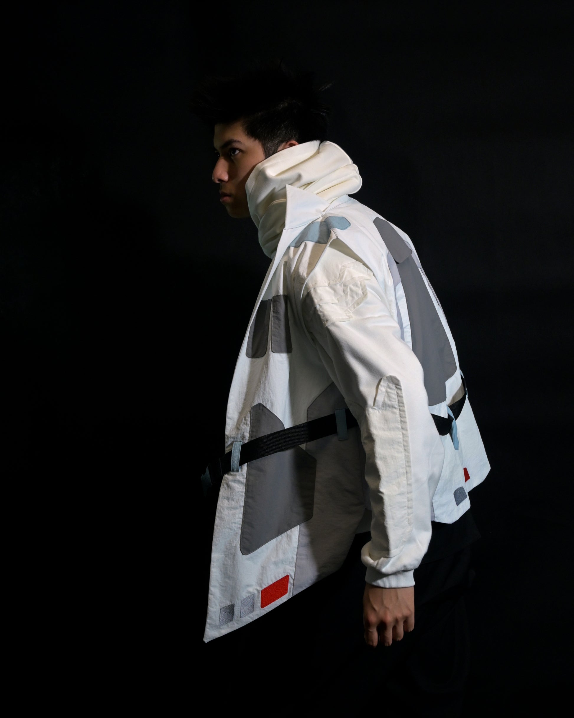 white sci-fi clothing cyberpunk techwear vest, side model view