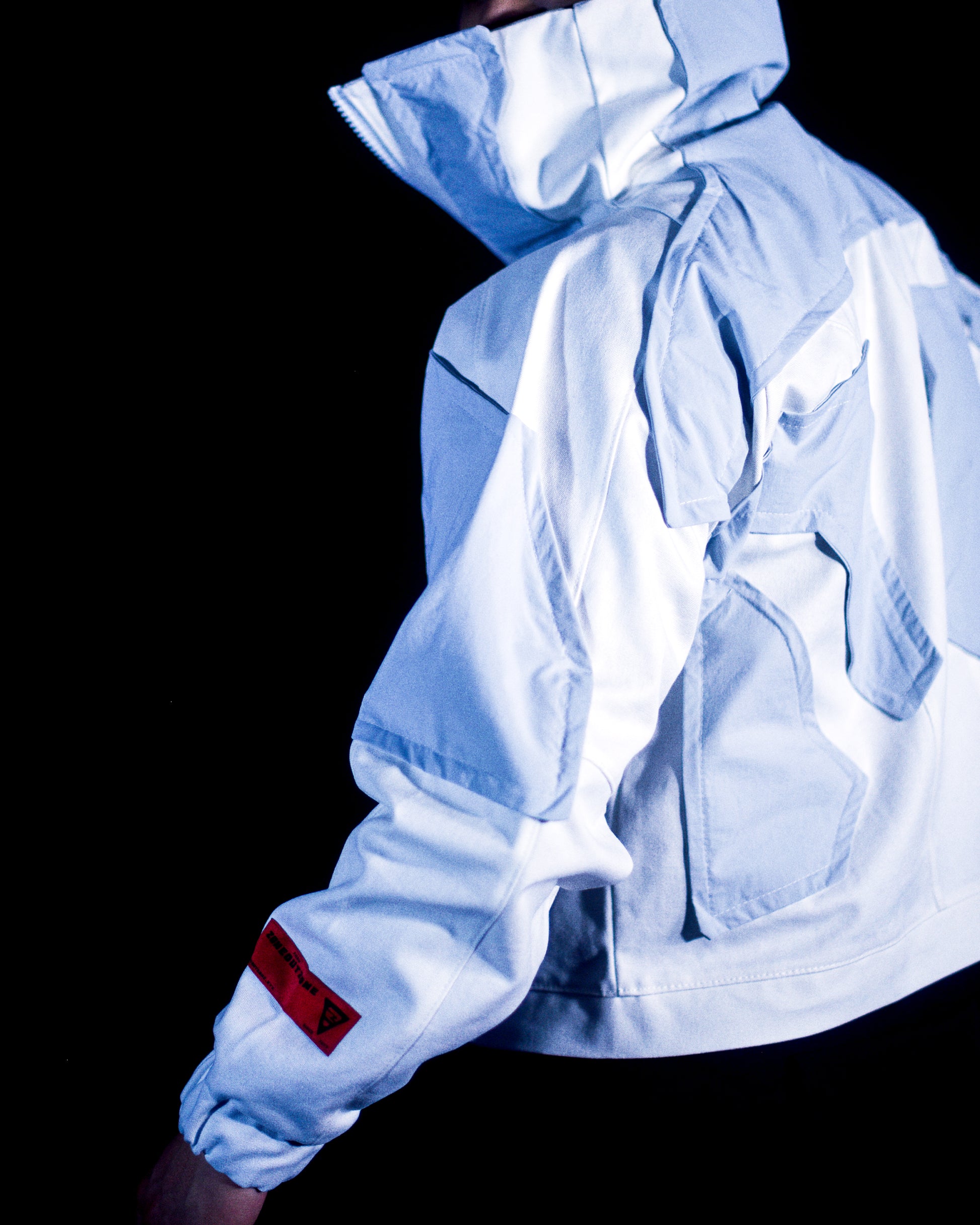 white ski ice planet sci-fi futuristic cyberpunk jacket, side model view
