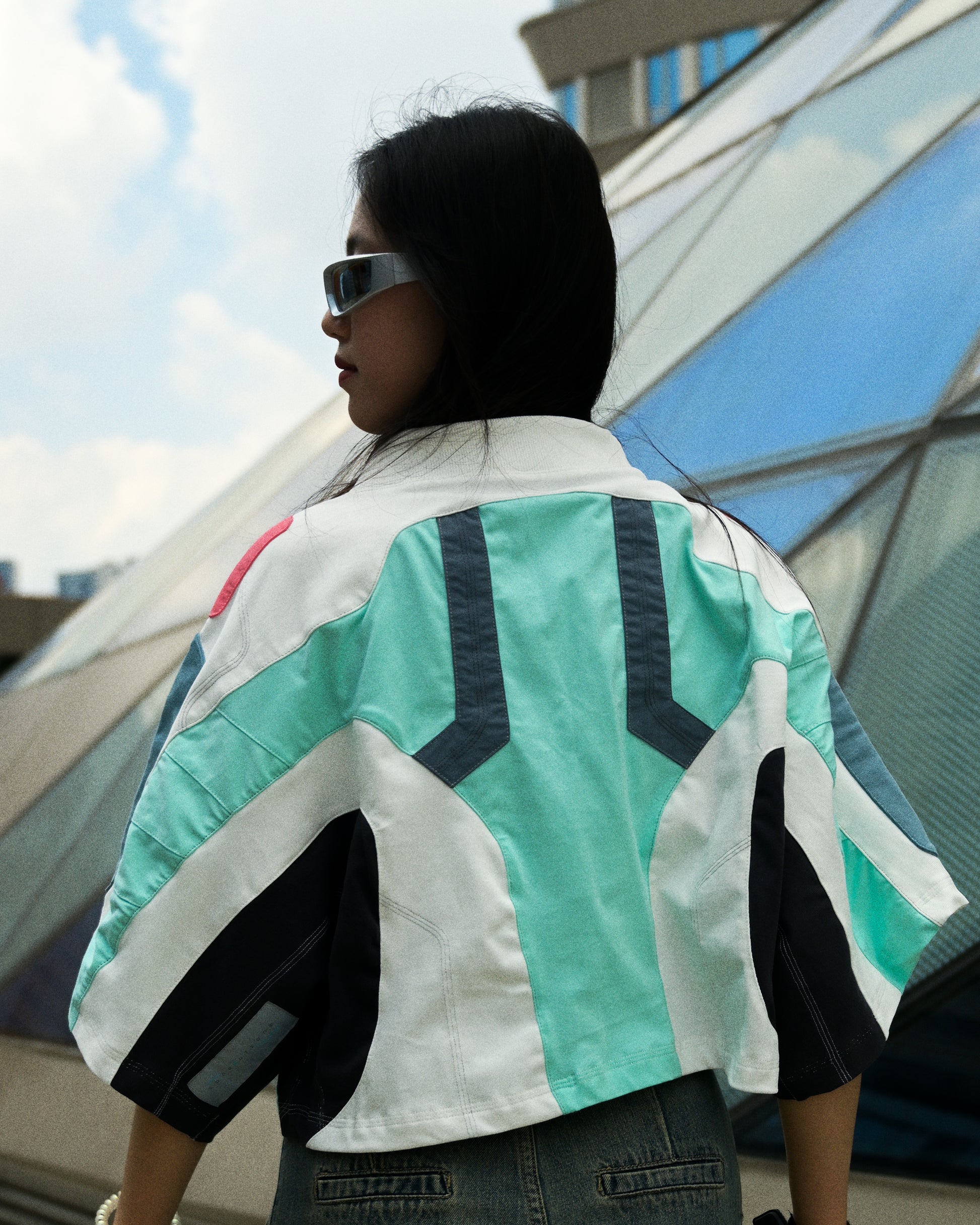 white turbo cyberpunk cropped womens tee, back model view